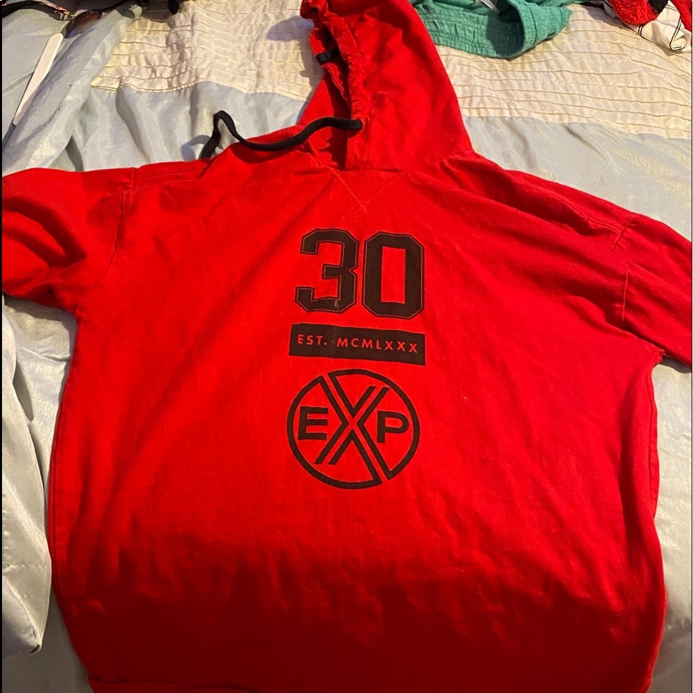 A name brand red long sleeve shirt